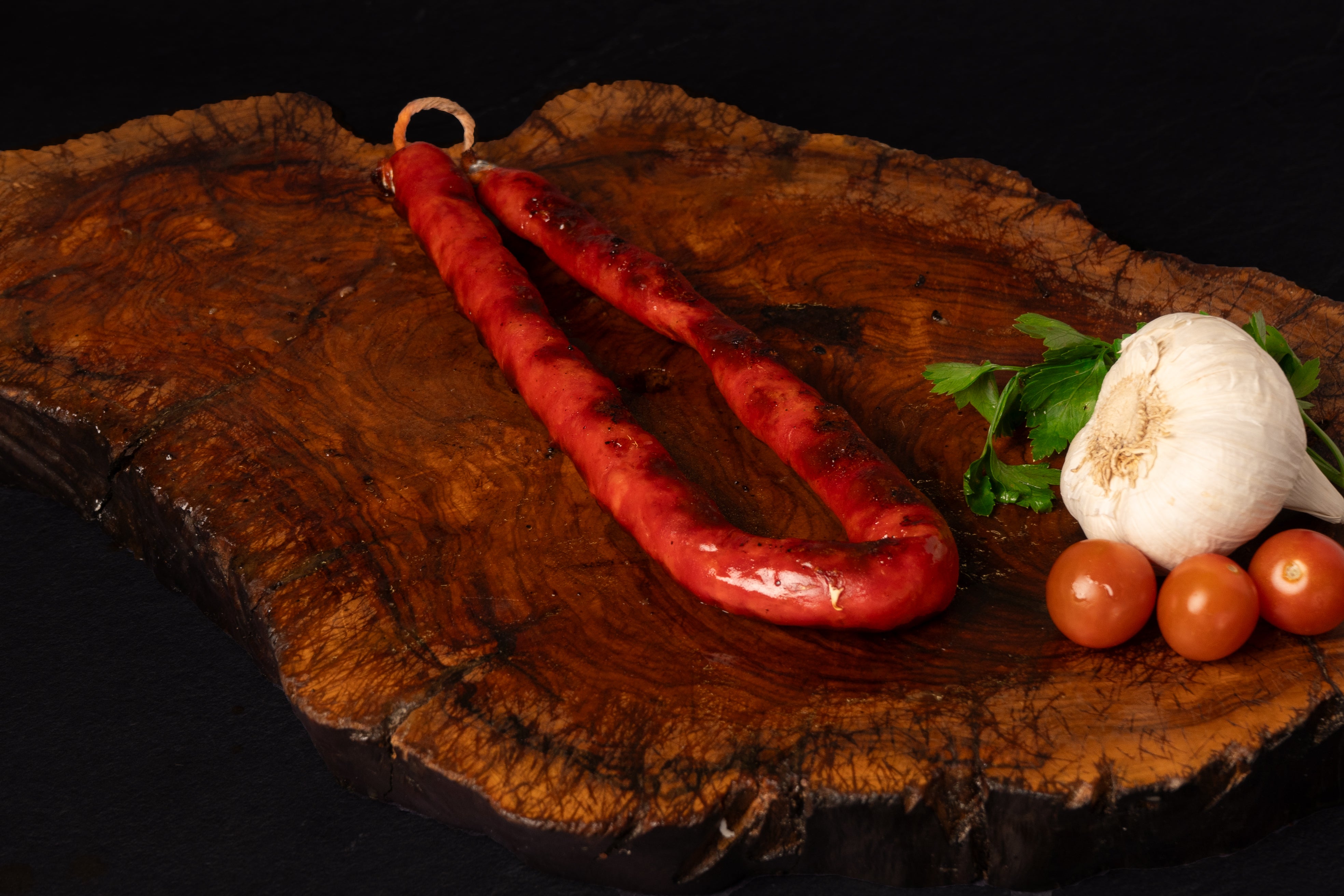 Chistorra cocinada en la brasa.