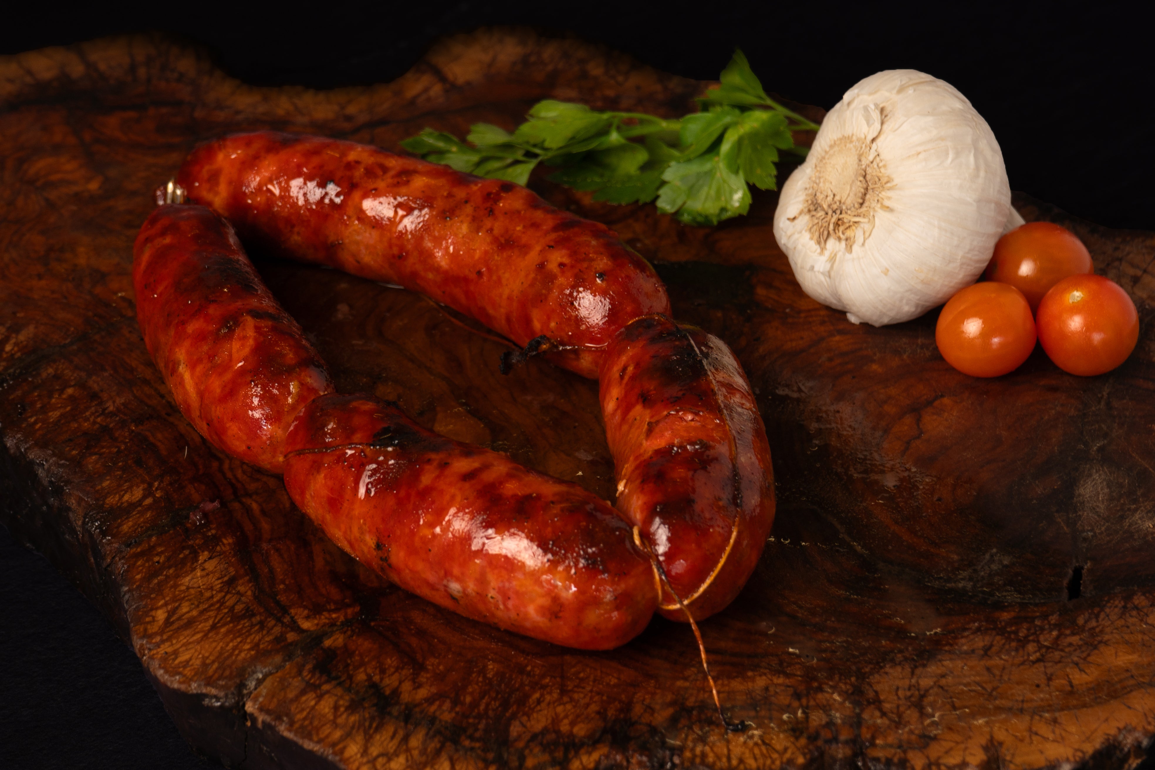 Chorizo fresco cocinado en la brasa.